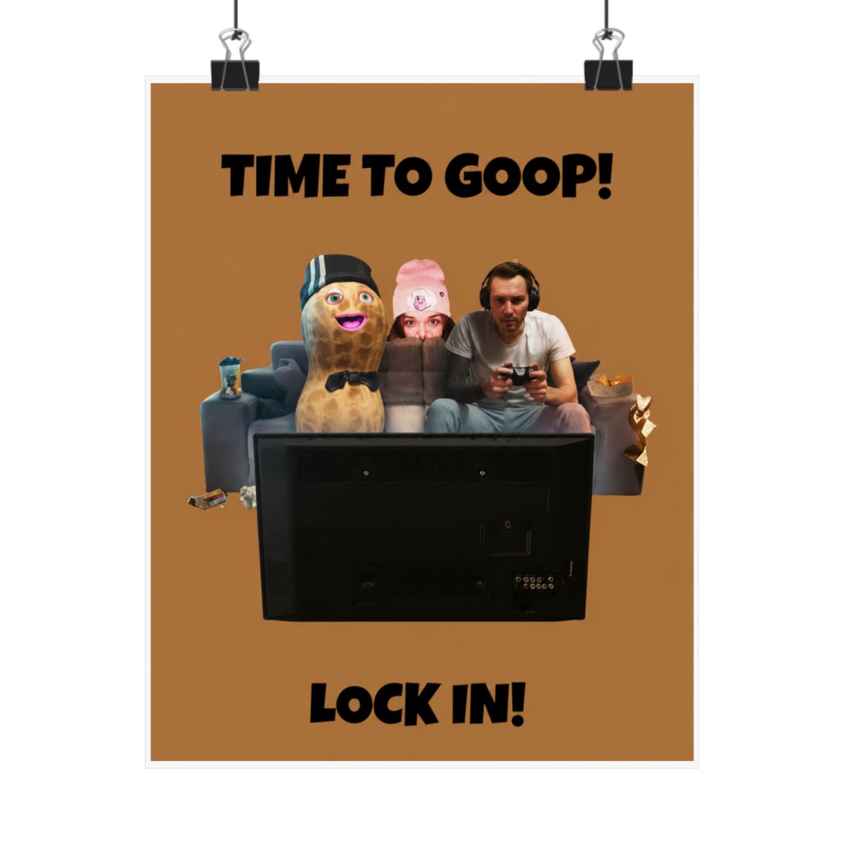 Poster with the text "TIME TO GOOP!" and "LOCK IN!". The image features a cartoon peanut, two people, and a person playing a video game. The background is a solid brown colour